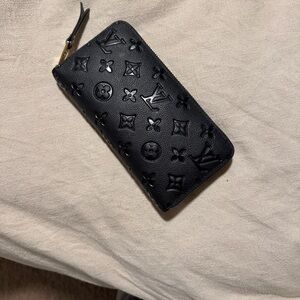 Louis Vuitton black embossed wallet